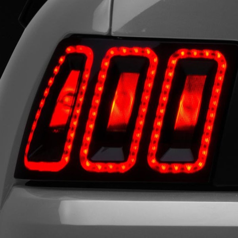 Raxiom 99-04 Ford Mustang Excluding 99-01 Cobra Icon LED Tail Lights- Black Housing (Smoked Lens)