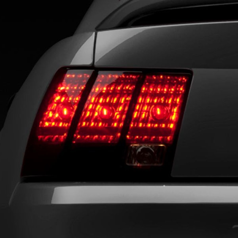 Raxiom 99-04 Ford Mustang Excluding 99-01 Cobra Tail Lights- Black Housing (Smoked Lens)